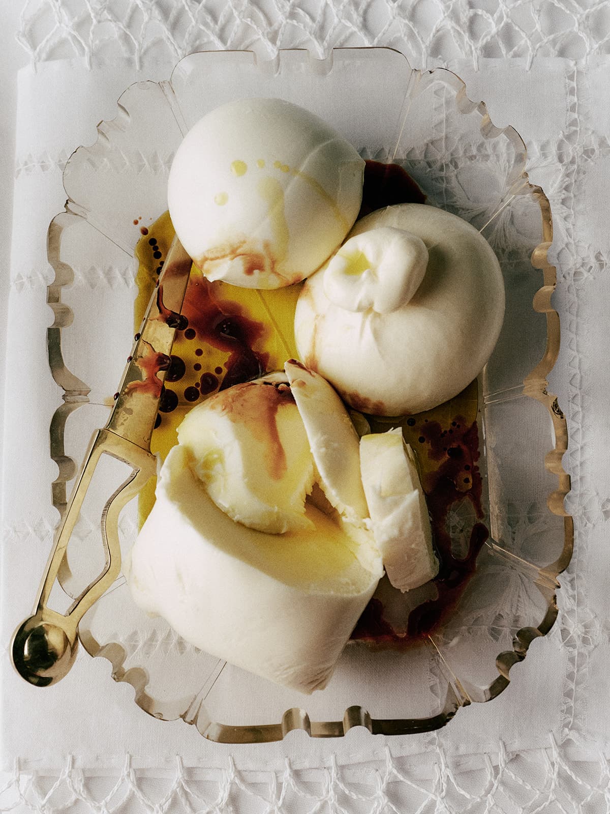 Plate With Cheese and Olive Oil and Balsamic Vinegar