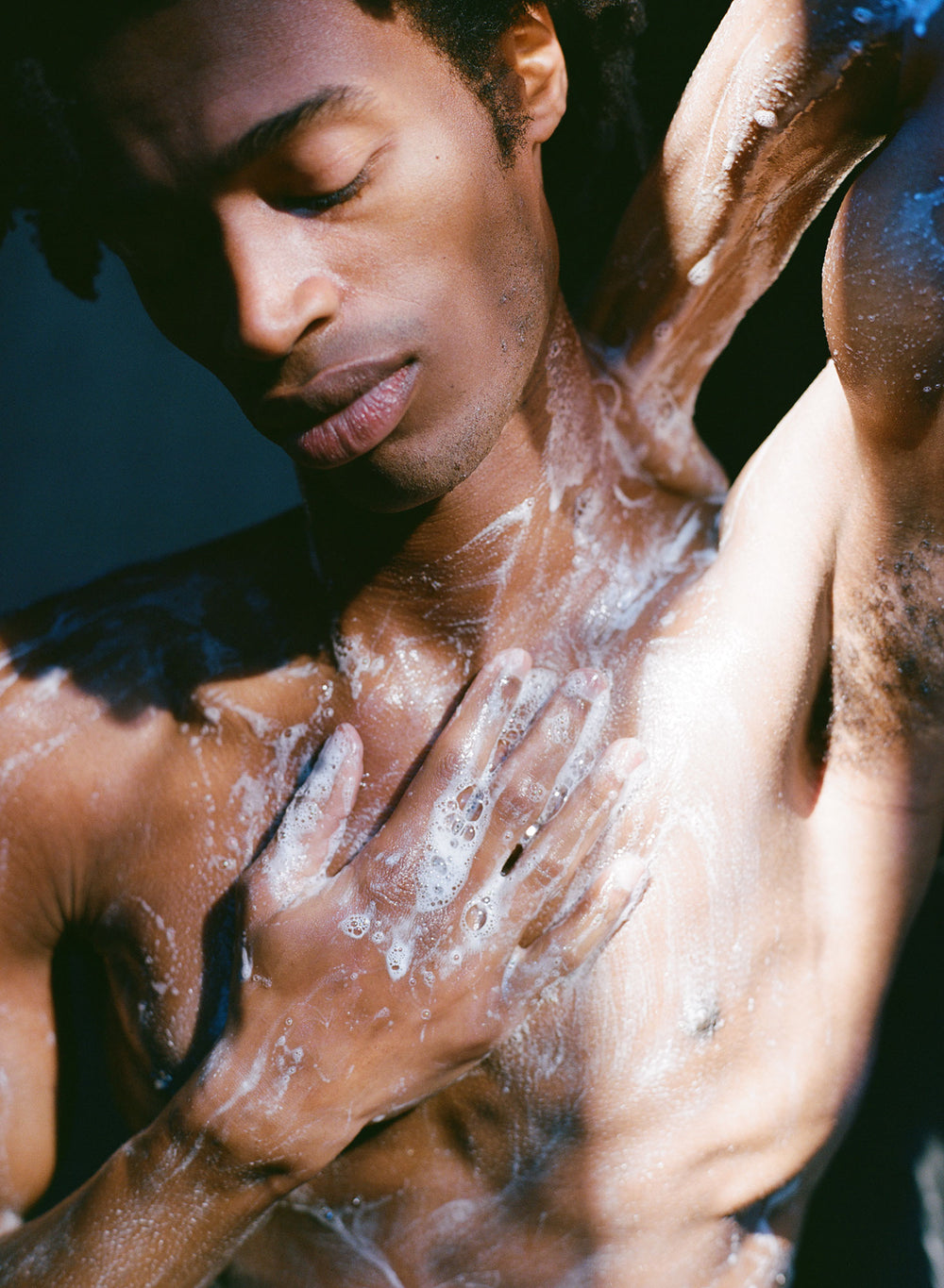Man Lathering Up In Soap