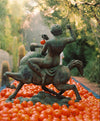 Scenic outdoor garden setting with vibrant red tomatoes, suggesting the fresh and natural essence of the tomato candle.