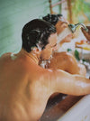 Man And Woman Showering Together In A Bathtub